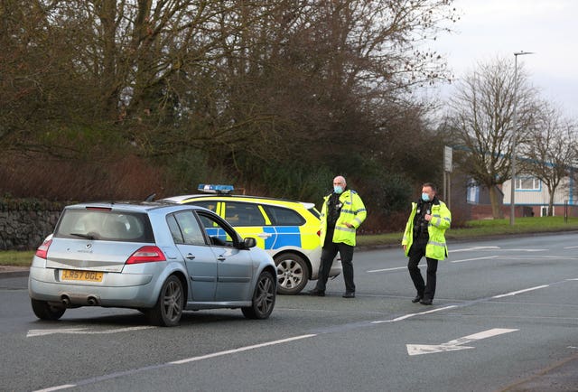 Police officers are at the scene outside the Wockhardt pharmaceutical manufacturing facility (Peter Byrne/PA)