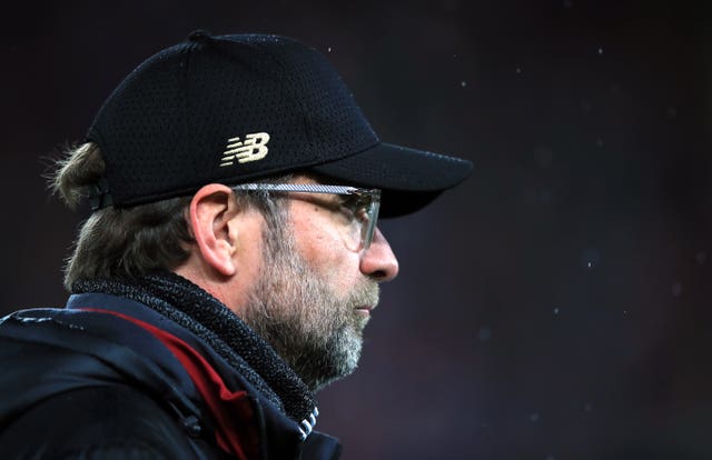 Jurgen Klopp's Liverpool are at Fulham on Sunday (Peter Byrne/PA).