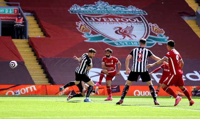 Mohamed Salah, centre left, scores Liverpool''s goal against Newcastle