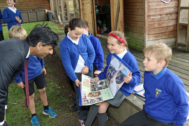 Rishi Sunak with pupils from the Pickhill Church of England Primary School eco team near Thirsk, North Yorkshire