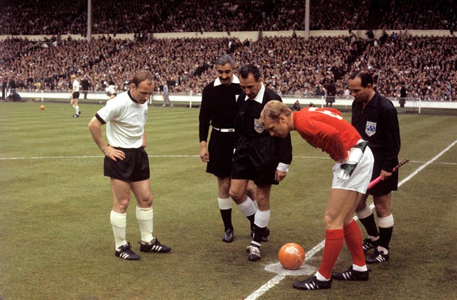 Uwe Seeler, left, and England captain Bobby Moore before the 1966 World Cup final