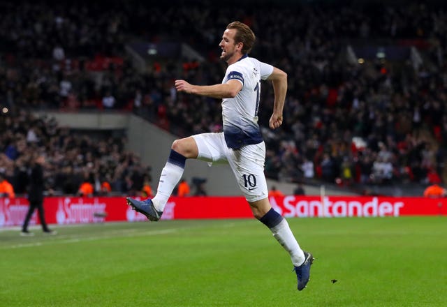 Two goals in the last 12 minutes from Harry Kane kept Spurs in the Champions League 