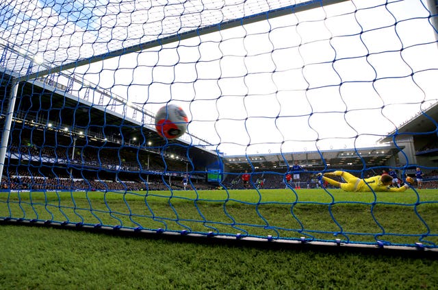 Jordan Pickford (right) allowed Bruno Fernandes' shot to sneak under him 