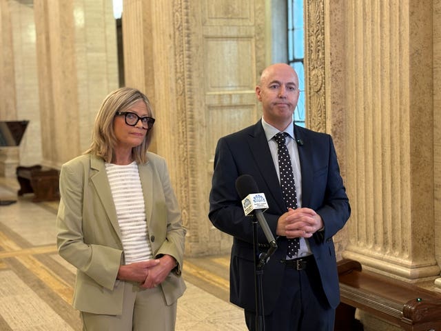 Ulster Unionist leader Jon Burrows speaks to the media, accompanied by deputy leader Diana Armstrong