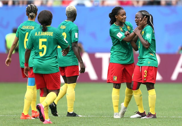 Cameroon's players appear dejected after VAR rules out their goal 