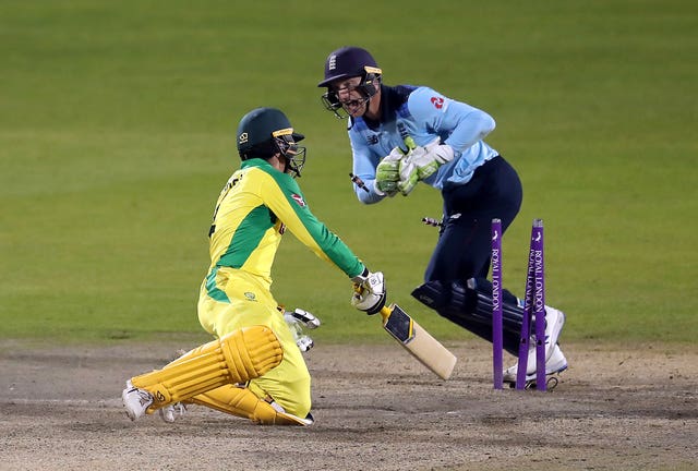 England's Jos Buttler stumps Australia's Alex Carey to seal a 24-run win and level the One-Day International series at 1-1. The decider is at Old Trafford on Wednesday