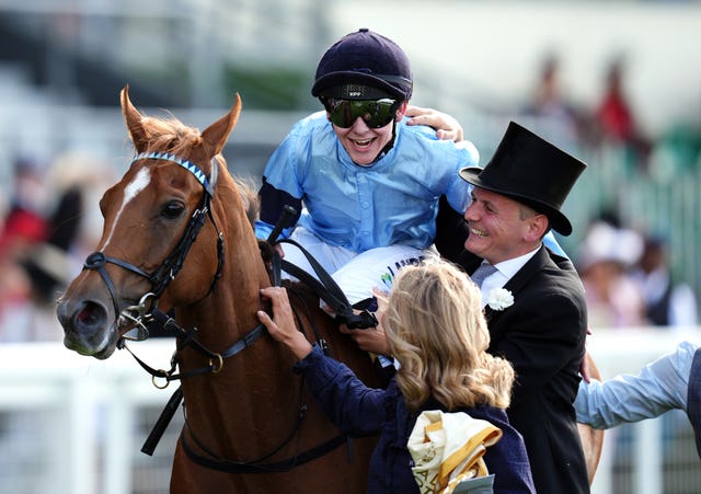 Billy Loughnane celebrates with George Boughey after winning the Sandringham Stakes