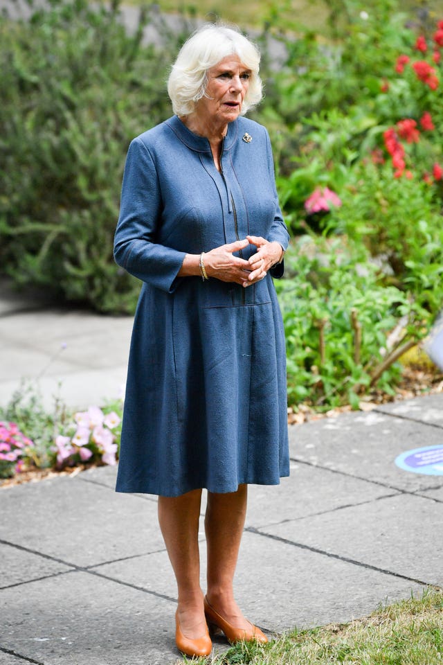 The Duchess of Cornwall chats with NHS staff and frontline key workers during a visit to Gloucestershire Royal Hospital