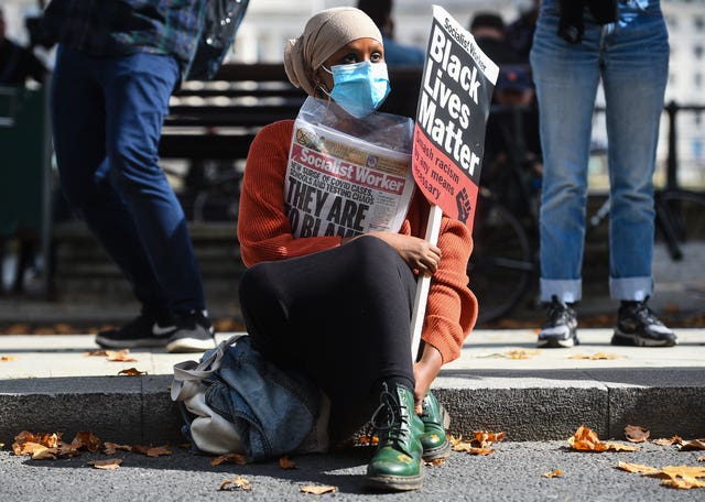 Anti-racism protesters outside New Scotland Yard in London