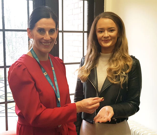 Woman reunited with lost ring