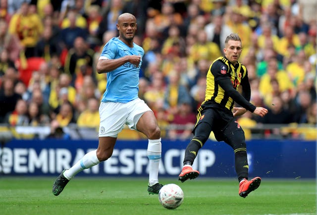 Kompany, left, had one of his easier afternoons at work 