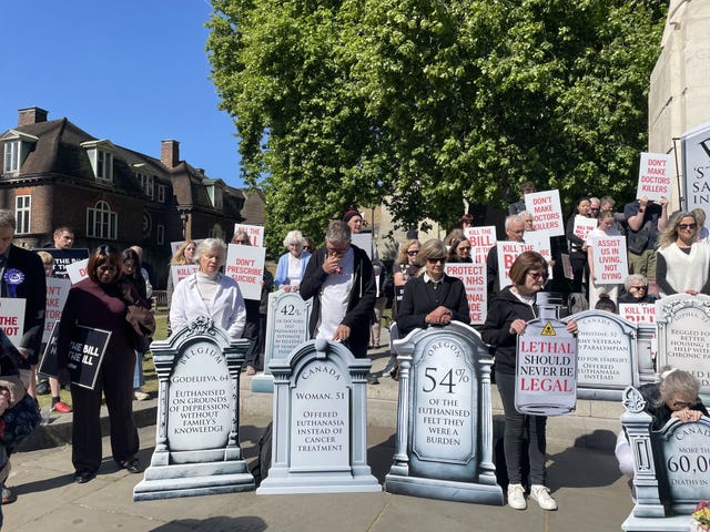 Campaigners opposed to the assisted dying legislation demonstrating outside the Palace of Westminster