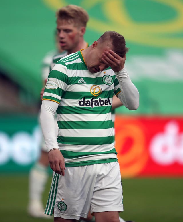 Leigh Griffiths holds his head in disappointment