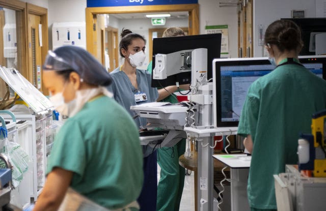 Staff nurses work in the corridor 