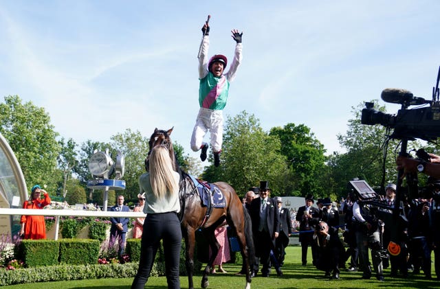 Frankie Dettori leaps in celebration from Coppice (David Davies/PA)