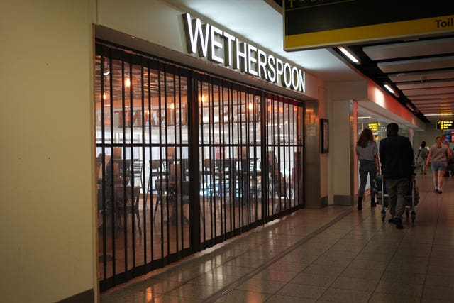 Shutters down on the entrance to the Wetherspoon pub