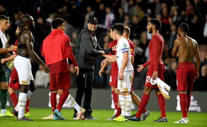 Liverpool’s players were celebrating after beating Mk Dons before the problem came to light