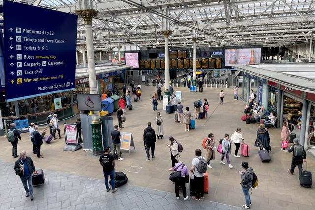View of people waiting for a train at Edinburgh Waverly