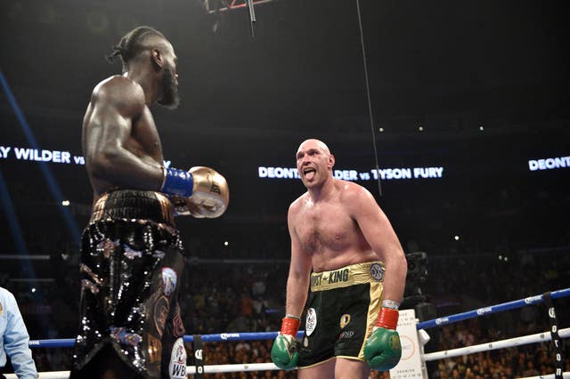 Deontay Wilder and Tyson Fury during the WBC heavyweight title bout 