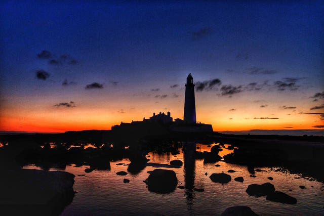 The sunrise over St Mary’s lighthouse at Whitley Bay 