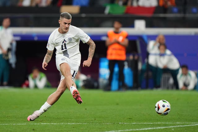 Slovenia forward Benjamin Sesko in action at Euro 2024