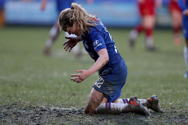 Chelsea's Erin Cuthbert kneels in the mud during the Women's Super League draw with Liverpool