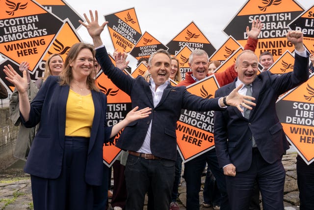 MSP Sanne Dijkstra-Downie with Alex Cole-Hamilton and Sir Ed Davey at a Liberal Democrat gathering