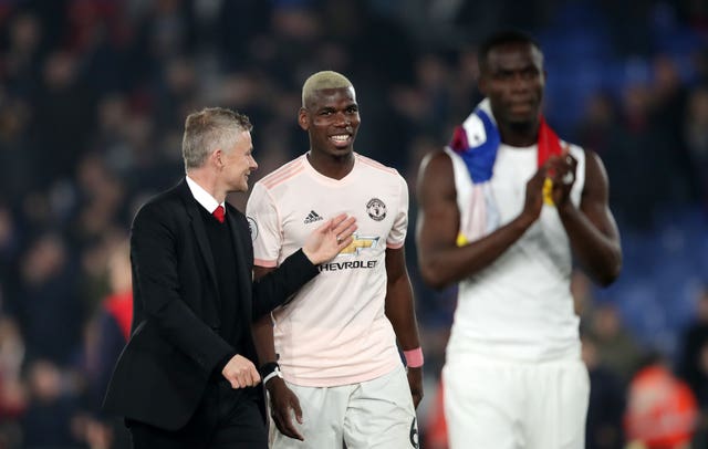 Paul Pogba and Ole Gunnar Solskjaer after beating Palace on Wednesday