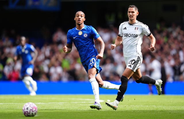 Chelsea’s Joao Pedro (left) and Fulham’s Sasa Lukic in action