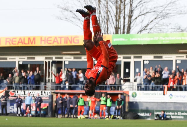 Kazenga LuaLua celebrated Luton's third goal in style as they beat Doncaster to make it 26 league games unbeaten