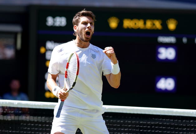 Cameron Norrie celebrates breaking serve in the first game