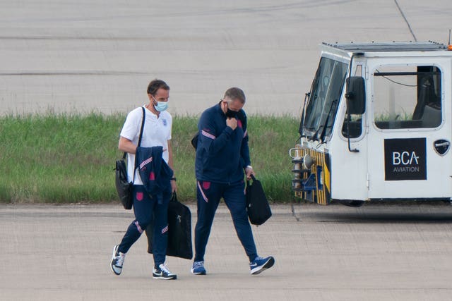 England manager Gareth Southgate walks towards the plane to Rome at Birmingham Airport