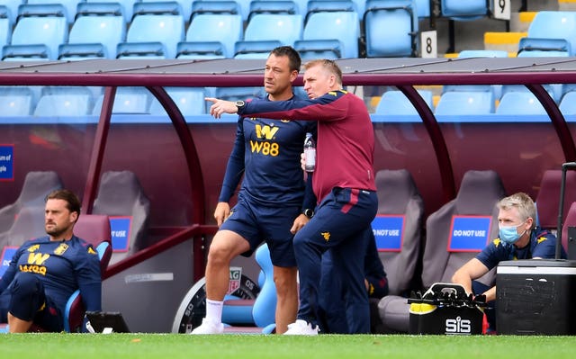 Terry (left) became assistant to Dean Smith (right) in October 2018 (Laurence Griffiths/NMC Pool/PA).