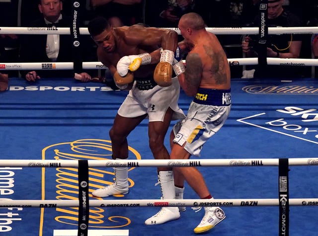 Oleksandr Usyk, right, defeated Anthony Joshua last September (Nick Potts/PA)