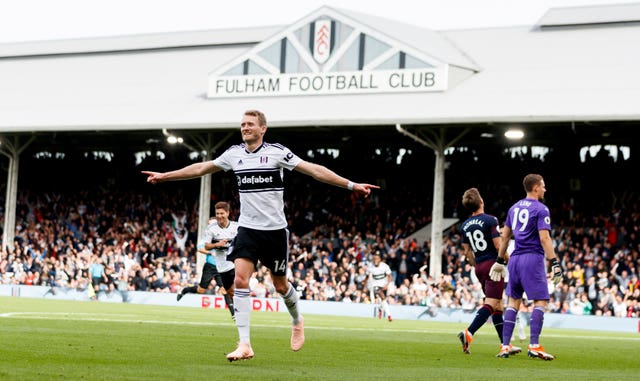 Andre Schurrle celebrates Fulham's equaliser