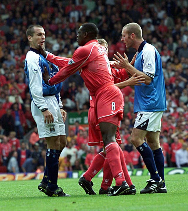 Emile Heskey (centre) gets to grips with Paul Ritchie during a Premier League match in September 2000