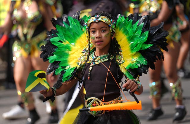 Participants taking part in the family day at the Notting Hill Carnival in London