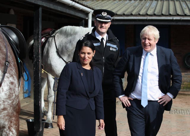 John Robins with Home Secretary Priti Patel and Mr Johnson