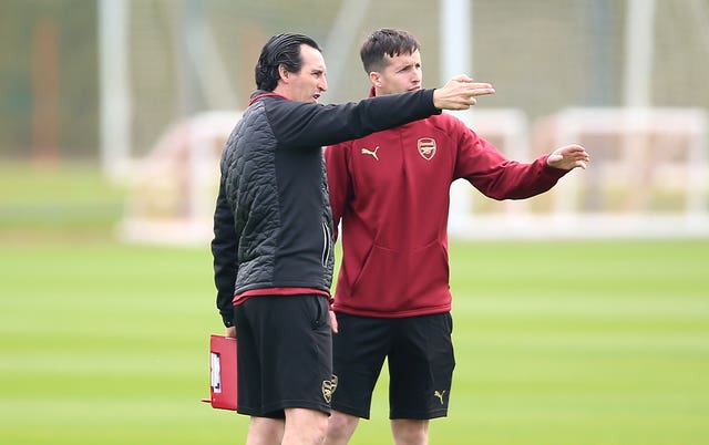 Unai Emery, left