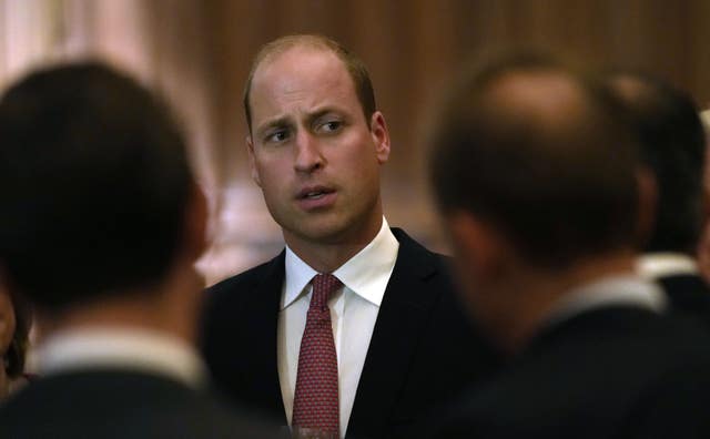 The Duke of Cambridge meets attendees during a reception