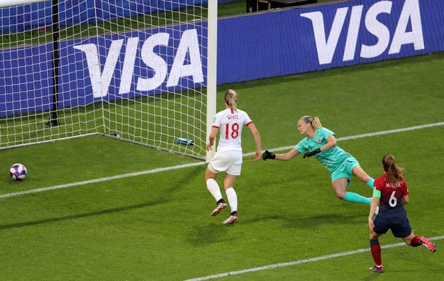 Ellen White, left, taps in England's second goal