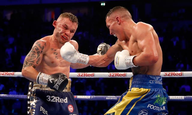 Warrington's spectacular win over Carl Frampton, left,took place on the same night as Dillian Whyte-Dereck Chisora II (Martin Rickett/PA)