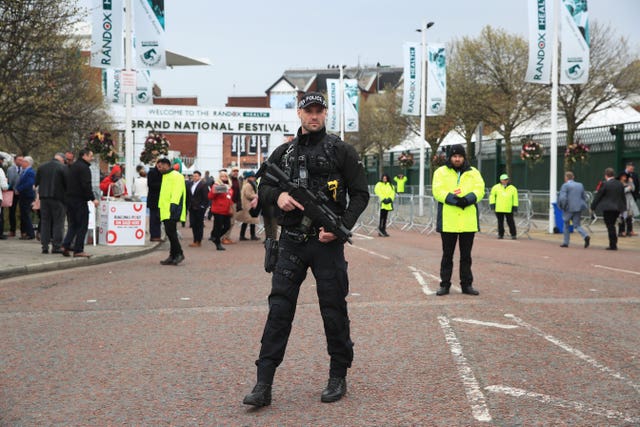 Armed police at the entrance to Aintree Racecourse