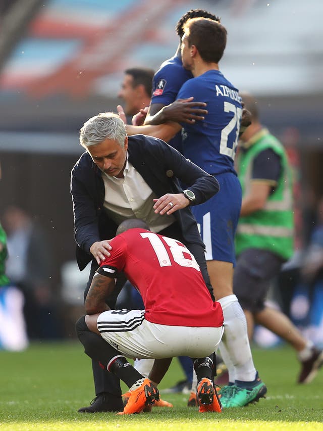 Mourinho consoles Ashley Young after United lost the 2018 FA Cup final to former club Chelsea