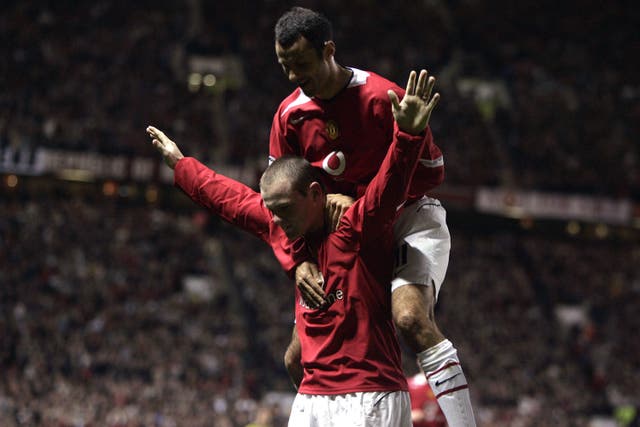 Ryan Giggs jumps on Wayne Rooney's back after his hat-trick goal Ryan Giggs jumps on Wayne Rooney’s back after his hat-trick goal