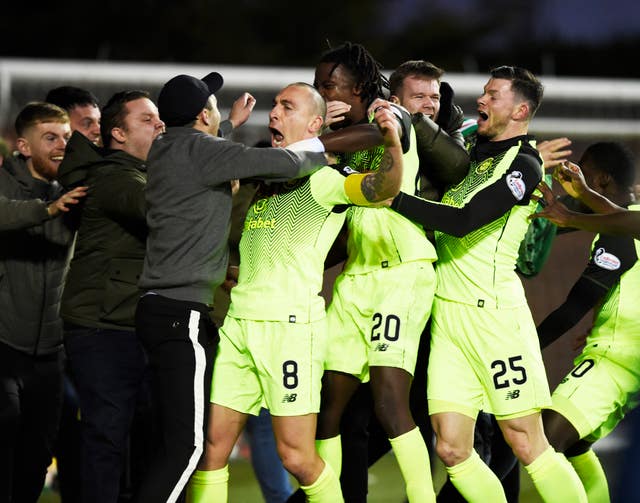 Celtic fans spilled out of the stands to celebrate with Scott Brown