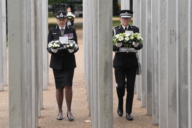 Chief Constable of the British Transport Police Lucy D’Orsi and Metropolitan Police Service Commissioner Sir Mark Rowley lay a wreath at the memorial on the 20th anniversary (