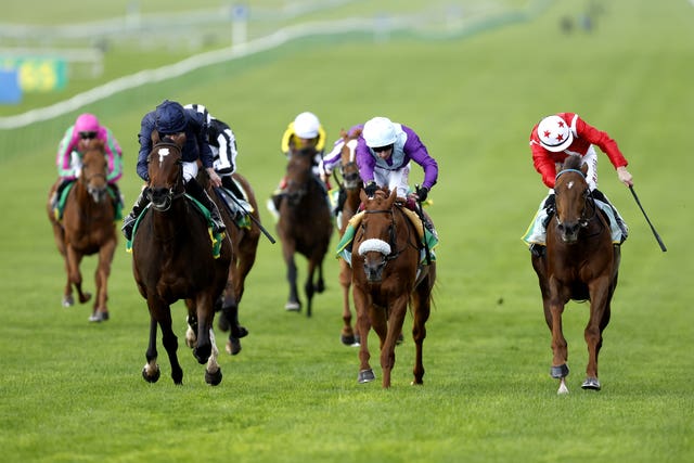 Shuwari (right) in action in the Fillies' Mile 
