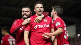 Wrexham’s Paul Mullin, centre, scored twice from the penalty spot (Peter Byrne/PA)