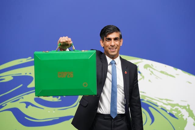 Rishi Sunak holds his Green Box at the Cop26 summit in Glasgow